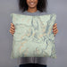 Person holding 18x18 Custom Baldy Cinco Colorado Map Throw Pillow in Woodblock