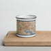 Front View Custom Baltimore Maryland Map Enamel Mug in Woodblock on Cutting Board