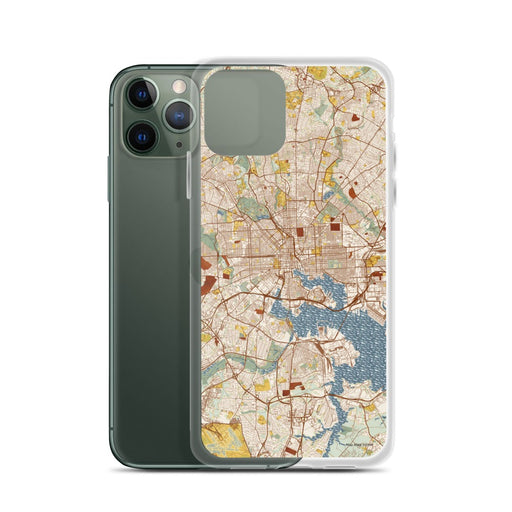 Custom Baltimore Maryland Map Phone Case in Woodblock on Table with Laptop and Plant