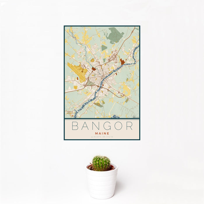 12x18 Bangor Maine Map Print Portrait Orientation in Woodblock Style With Small Cactus Plant in White Planter