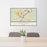 24x36 Bangor Maine Map Print Lanscape Orientation in Woodblock Style Behind 2 Chairs Table and Potted Plant