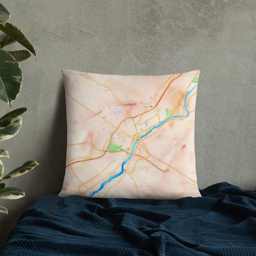 Custom Bangor Maine Map Throw Pillow in Watercolor on Bedding Against Wall
