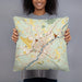 Person holding 18x18 Custom Bangor Maine Map Throw Pillow in Woodblock