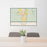 24x36 Basin Wyoming Map Print Lanscape Orientation in Woodblock Style Behind 2 Chairs Table and Potted Plant
