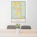 24x36 Basin Wyoming Map Print Portrait Orientation in Woodblock Style Behind 2 Chairs Table and Potted Plant