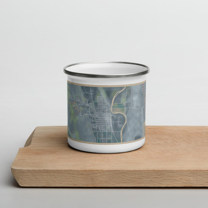 Front View Custom Basin Wyoming Map Enamel Mug in Afternoon on Cutting Board
