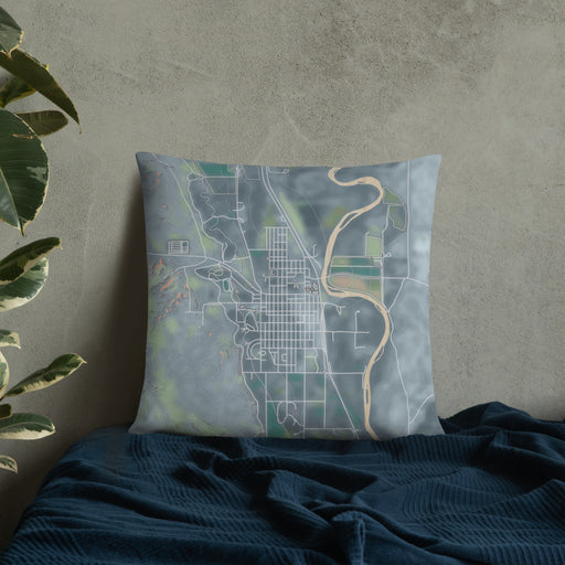 Custom Basin Wyoming Map Throw Pillow in Afternoon on Bedding Against Wall