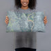 Person holding 20x12 Custom Basin Wyoming Map Throw Pillow in Afternoon