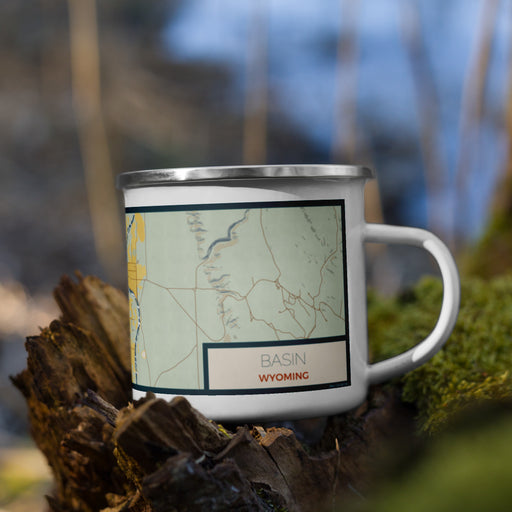 Right View Custom Basin Wyoming Map Enamel Mug in Woodblock on Grass With Trees in Background