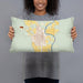 Person holding 20x12 Custom Basin Wyoming Map Throw Pillow in Woodblock