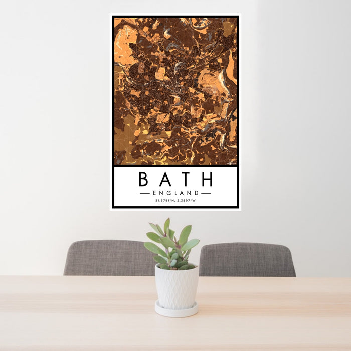 24x36 Bath England Map Print Portrait Orientation in Ember Style Behind 2 Chairs Table and Potted Plant