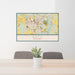 24x36 Bath England Map Print Lanscape Orientation in Woodblock Style Behind 2 Chairs Table and Potted Plant
