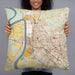 Person holding 22x22 Custom Baton Rouge Louisiana Map Throw Pillow in Woodblock
