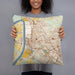Person holding 18x18 Custom Baton Rouge Louisiana Map Throw Pillow in Woodblock