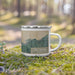 Right View Custom Bay Harbor Michigan Map Enamel Mug in Afternoon on Grass With Trees in Background