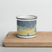 Front View Custom Bay Harbor Michigan Map Enamel Mug in Woodblock on Cutting Board