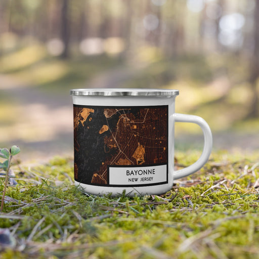 Right View Custom Bayonne New Jersey Map Enamel Mug in Ember on Grass With Trees in Background