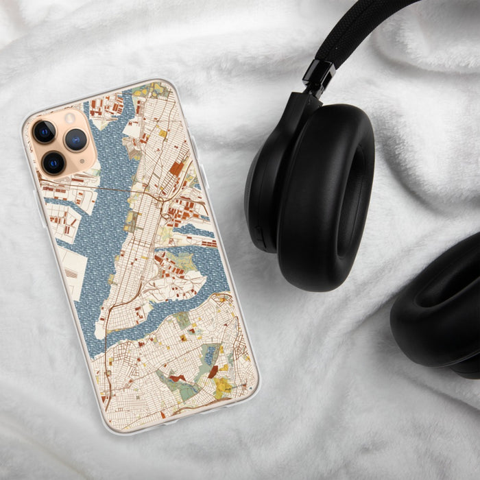 Custom Bayonne New Jersey Map Phone Case in Woodblock on Table with Black Headphones