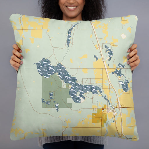 Person holding 22x22 Custom Bear Lake Wisconsin Map Throw Pillow in Woodblock