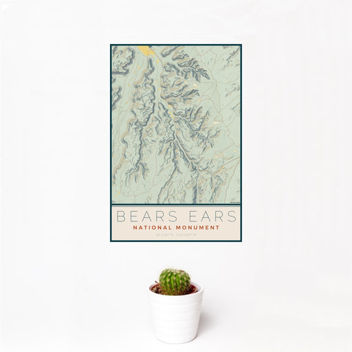 12x18 Bears Ears National Monument Map Print Portrait Orientation in Woodblock Style With Small Cactus Plant in White Planter