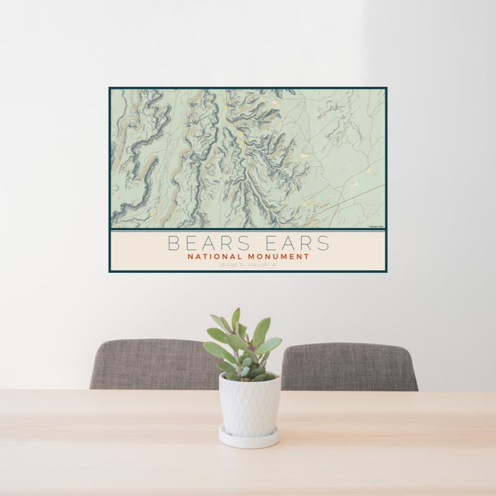 24x36 Bears Ears National Monument Map Print Lanscape Orientation in Woodblock Style Behind 2 Chairs Table and Potted Plant