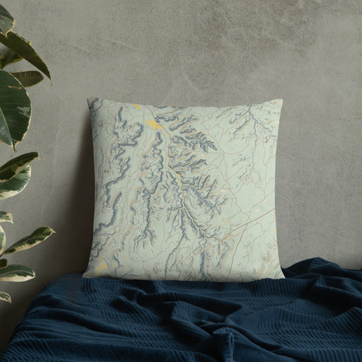 Custom Bears Ears National Monument Map Throw Pillow in Woodblock on Bedding Against Wall