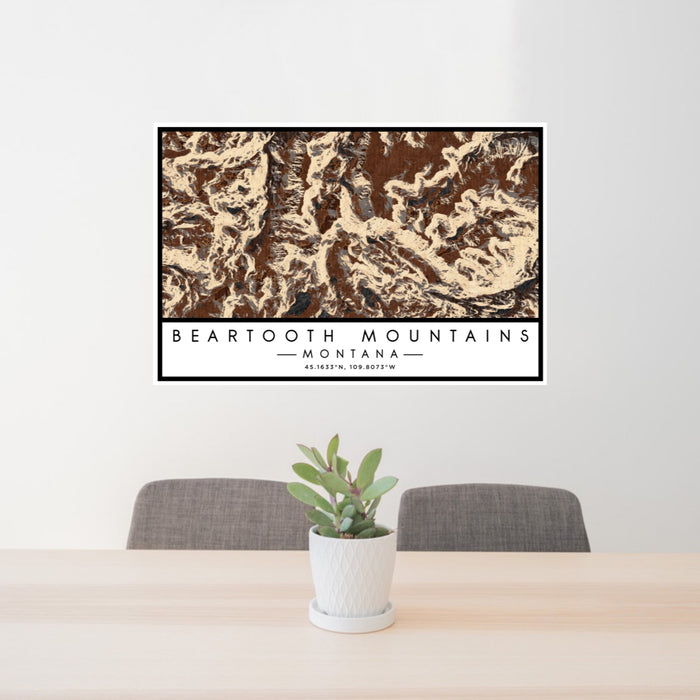 24x36 Beartooth Mountains Montana Map Print Lanscape Orientation in Ember Style Behind 2 Chairs Table and Potted Plant
