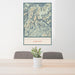 24x36 Beartooth Mountains Montana Map Print Portrait Orientation in Woodblock Style Behind 2 Chairs Table and Potted Plant