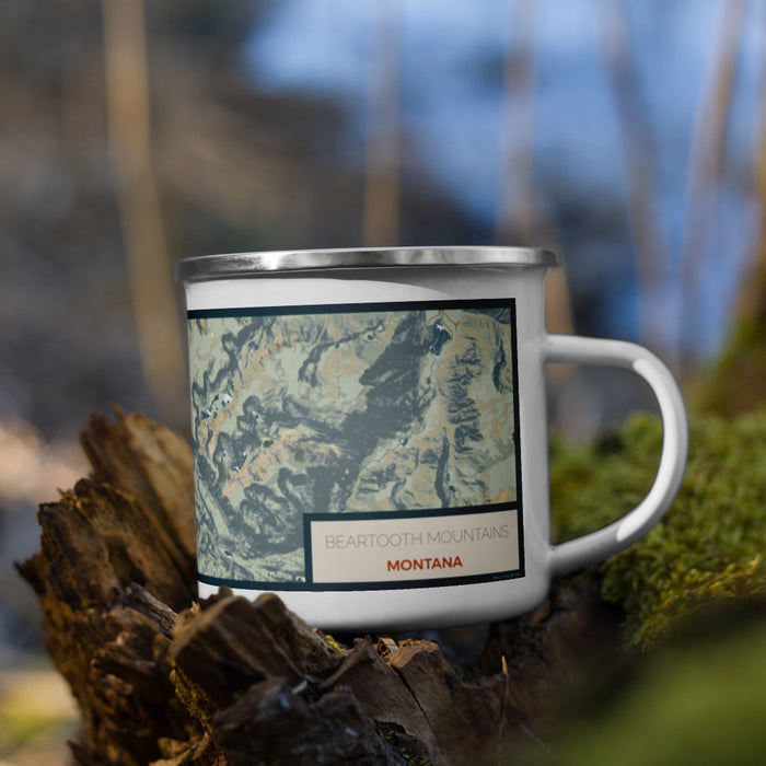 Right View Custom Beartooth Mountains Montana Map Enamel Mug in Woodblock on Grass With Trees in Background