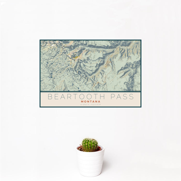 12x18 Beartooth Pass Montana Map Print Landscape Orientation in Woodblock Style With Small Cactus Plant in White Planter