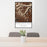 24x36 Beartooth Pass Montana Map Print Portrait Orientation in Ember Style Behind 2 Chairs Table and Potted Plant