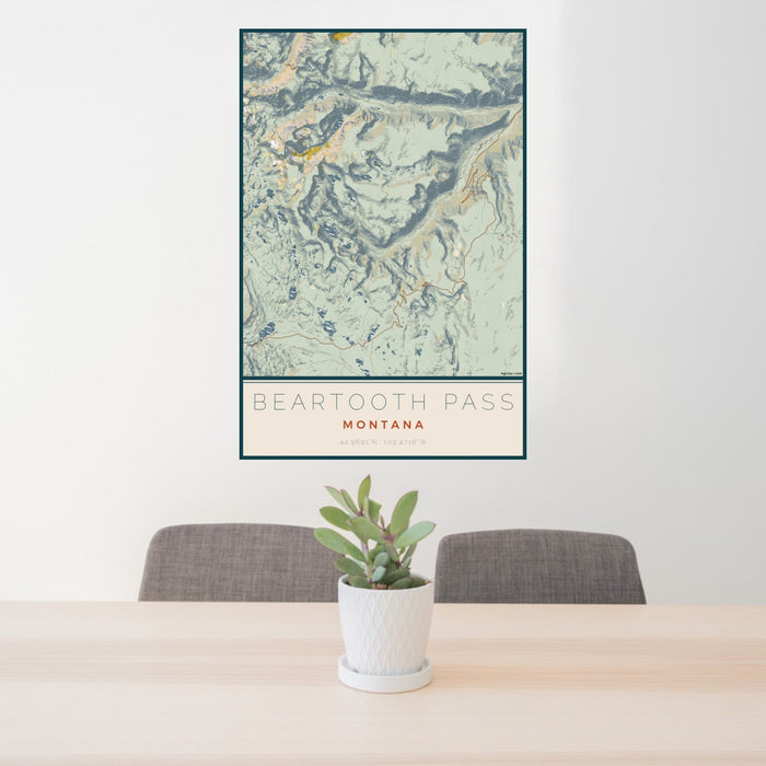 24x36 Beartooth Pass Montana Map Print Portrait Orientation in Woodblock Style Behind 2 Chairs Table and Potted Plant