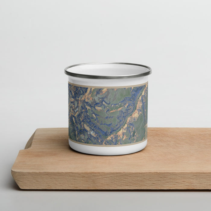 Front View Custom Beartooth Pass Montana Map Enamel Mug in Afternoon on Cutting Board