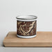 Front View Custom Beartooth Pass Montana Map Enamel Mug in Ember on Cutting Board