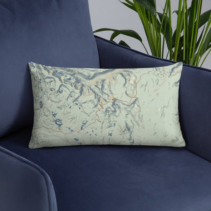 Custom Beartooth Pass Wyoming Map Throw Pillow in Woodblock on Blue Colored Chair