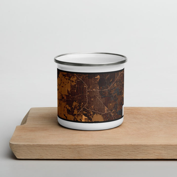 Front View Custom Beaumont Texas Map Enamel Mug in Ember on Cutting Board