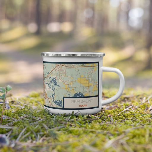 Right View Custom Beaumont Texas Map Enamel Mug in Woodblock on Grass With Trees in Background