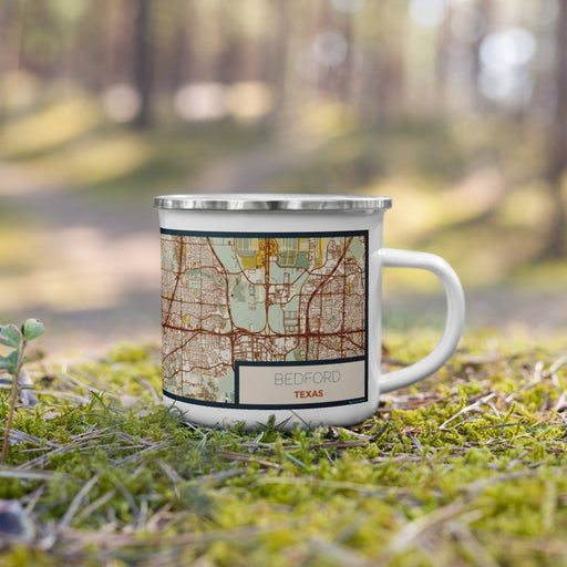 Right View Custom Bedford Texas Map Enamel Mug in Woodblock on Grass With Trees in Background