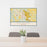 24x36 Belgrade Montana Map Print Lanscape Orientation in Woodblock Style Behind 2 Chairs Table and Potted Plant