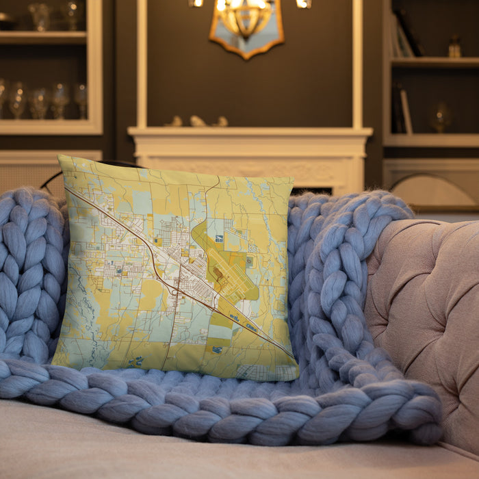 Custom Belgrade Montana Map Throw Pillow in Woodblock on Cream Colored Couch