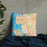 Custom Bellevue Washington Map Throw Pillow in Watercolor on Bedding Against Wall