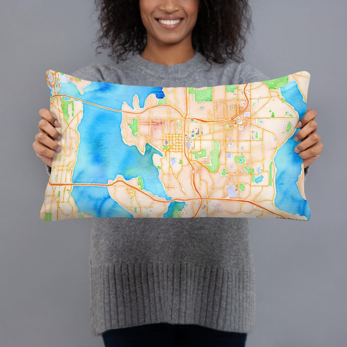 Person holding 20x12 Custom Bellevue Washington Map Throw Pillow in Watercolor