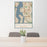 24x36 Bellevue Washington Map Print Portrait Orientation in Woodblock Style Behind 2 Chairs Table and Potted Plant