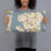 Person holding 20x12 Custom Bellevue Washington Map Throw Pillow in Woodblock