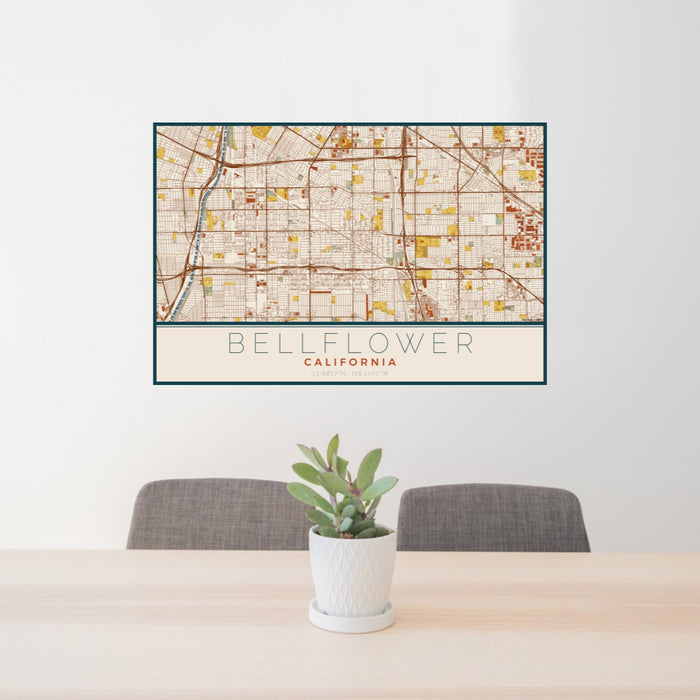 24x36 Bellflower California Map Print Lanscape Orientation in Woodblock Style Behind 2 Chairs Table and Potted Plant