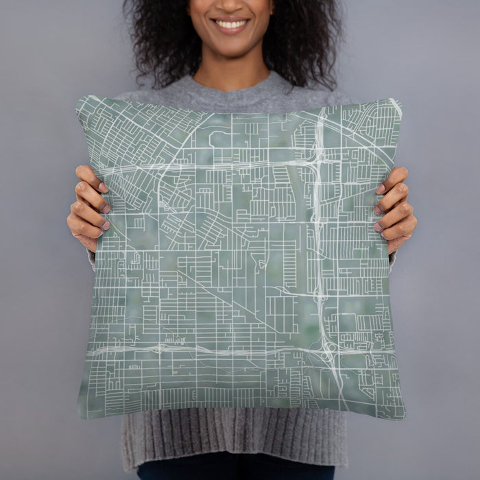 Person holding 18x18 Custom Bellflower California Map Throw Pillow in Afternoon