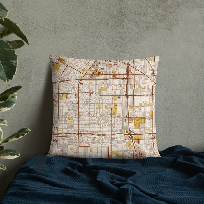 Custom Bellflower California Map Throw Pillow in Woodblock on Bedding Against Wall