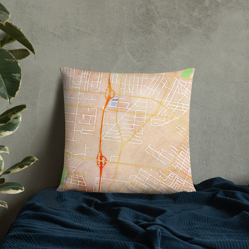 Custom Bell Gardens California Map Throw Pillow in Watercolor on Bedding Against Wall