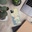 Custom Bellingham Washington Map Phone Case in Woodblock on Table with Laptop and Plant