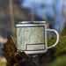 Right View Custom Bellows Falls Vermont Map Enamel Mug in Woodblock on Grass With Trees in Background
